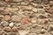 Old brown textured aged stone wall background