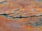old brown wooden tabletop texture background, surface teak tables with large cracks and scratches