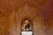 Old Buddha statue inside buddhist temple in Bagan, Myanmar.