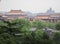 Old Buddhism Temple with Green Trees on Foreground. Red Asian Pagoda Towers. Ancient Architecture Asian Temples