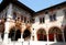 Old building with arcades and frescoes in Rovereto in the province of Trento (Italy)