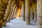 Old building with arched pathway and columns