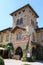 Old building in courtyard of ancient castle in Grazzano Visconti, Italy