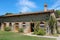 Old building in courtyard of ancient castle in Grazzano Visconti, Italy