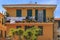 Old building facade in Ventimiglia in Liguria region of Italy