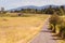 Old Building and Grass Field Along Olympic Discovery Trail in Sequim, WA