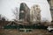 Old buildings on the background of new elite skyscrapers in the city.