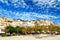 Old buildings on pictorial port of Symi island in Greece