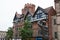 Old buildings on Queen Street including a statue of Brian Clough, football manager in Nottingham in the UK