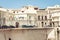 Old buildings in seafront of Ortygia Ortigia Island, Syracuse, traditional architecture of Sicily, Italy