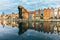 Old buildings and Zuraw crane near Motlawa river in Gdansk