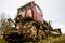 Old bulldozer standing alone in a field. Earthworks, old bulldozer on caterpillars.