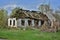 Old burned-out house in the village