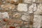 Old calcareous stone white brown square rectangle cement part of old defensive wall light background foundation