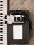 Old camera, film, piano, white flower