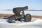 Old cannon on the embankment of Onega lake, winter day. Petrozavodsk, Karelia