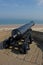 Old Cannon looking over beach, Northumberland.