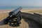 Old Cannon looking over beach, Northumberland.