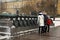 Old cannons shown in Moscow Kremlin. Tourists look at them