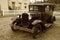 Old car in an Acadian village