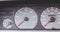 Old car dashboard of the 90s with speedometer, tachometer...