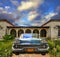 Old car parked in tropical house, cuba