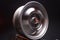 old car wheels titanium rims retro light alloy in a dark room long exposure photo