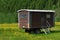 Old caravan on the meadow at countryside