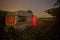 Old caravan in an overgrown field