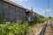 Old cargo train cart abandoned on a disused train line 