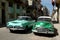 Old cars in downtown backstreet Havana