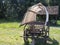 Old cart with tarpaulin