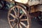 Old cartwheel of horse drawn wooden cart