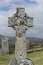 Old carved stone Celtic cross in London cemetery,