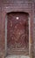 Old carved wooden door with decorative molding, Marrakech, Morocco