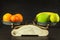 Old cast iron kitchen scale with fruit and vegetables. Healthy eating. Selling fruit.