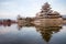 Old castle in japan. Matsumoto castle against blue sky in Nagono city, Japan