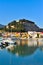 Old castle in a mediterranean city and the harbor