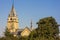 Old cathedral surrounded by trees in Ivano-Frankivsk city