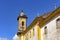 Old catholic bell church tower and facade of the 18th century