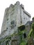 Old celtic castle tower isolated over white background, Blarney castle in Ireland, celtic fortress