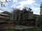 Old cemetery, tombstones, cross-stones, mountains, skies. Grass, trees. Armenia