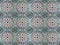 Old ceramic tiles with abstract pattern. Vintage glazed tiles texture and background.