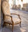 Old chair in a traditional street of Lecce, Italy.