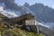 The old chalet Refuge du Couvercle over the Mer de Glace glacier