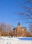 Old chapel on a college campus in winter vertical