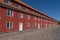 Old charming red building at the old fortress Kastellet, Copenhagen, Denmark