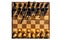 Old chessboard with chess and shadow, isolated on a white background with clipping path, overhead view, flatlay.