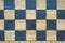 Old chessboard fragment