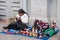 Old chiapas woman sitting on a street ground and doing hand made